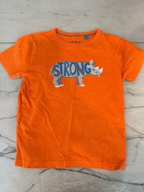 Mini Boden Orange Tee with Blue 'Strong' Rhino Graphic
